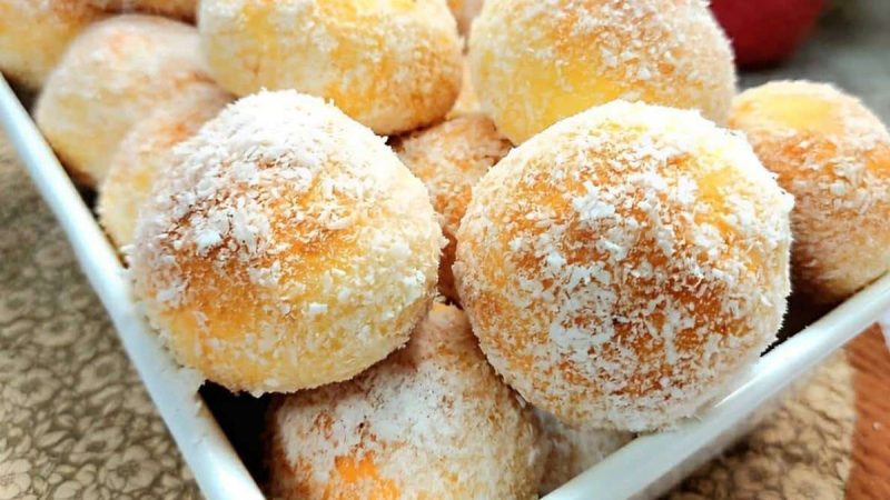 Desvendando o Segredo do Bolinho de Chuva Assado: Uma Delícia com Massa Fofinha Empanada com Coco Ralado